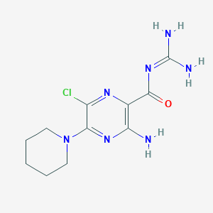 molecular formula C11H16ClN7O B040464 2-Pyrazinecarboxamide, 3-amino-N-(aminoiminomethyl)-6-chloro-5-(1-piperidinyl)- CAS No. 123529-15-7