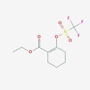 molecular formula C10H13F3O5S B040514 Ethyl 2-(((trifluoromethyl)sulfonyl)oxy)cyclohex-1-enecarboxylate CAS No. 122135-83-5