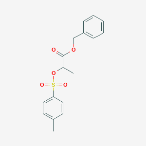 molecular formula C17H18O5S B040782 Benzyl 2-[(4-methylbenzene-1-sulfonyl)oxy]propanoate CAS No. 117589-36-3