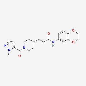 molecular formula C21H26N4O4 B4257474 N-(2,3-dihydro-1,4-benzodioxin-6-yl)-3-[1-(2-methylpyrazole-3-carbonyl)piperidin-4-yl]propanamide 