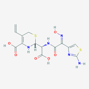 molecular formula C14H15N5O6S2 B042811 (2R)-2-[(R)-[[(2Z)-2-(2-Amino-1,3-thiazol-4-yl)-2-hydroxyiminoacetyl]amino]-carboxymethyl]-5-ethenyl-3,6-dihydro-2H-1,3-thiazine-4-carboxylic acid CAS No. 937819-42-6