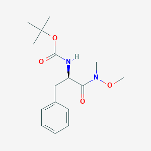 molecular formula C16H24N2O4 B043078 (R)-tert-Butyl (1-(methoxy(methyl)amino)-1-oxo-3-phenylpropan-2-yl)carbamate CAS No. 115186-33-9