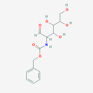 molecular formula C₁₄H₁₉NO₇ B043500 benzyl N-(3,4,5,6-tetrahydroxy-1-oxohexan-2-yl)carbamate CAS No. 16684-31-4