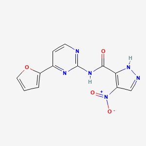 molecular formula C12H8N6O4 B4361620 N-[4-(2-furyl)-2-pyrimidinyl]-4-nitro-1H-pyrazole-3-carboxamide 