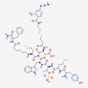 molecular formula C65H84N14O18S5 B043728 N-(3-((2-((4-Azido-2-hydroxybenzoyl)amino)ethyl)dithio)-1-oxopropyl)-L-alpha-aspartyl-O-sulfo-L-tyrosyl-L-methionyl-L-threonyl-L-tryptophyl-N-(6-((2-amino-2-oxo-1-(phenylmethyl)ethyl)amino)-6-oxohexyl)-L-methioninamide CAS No. 124894-89-9