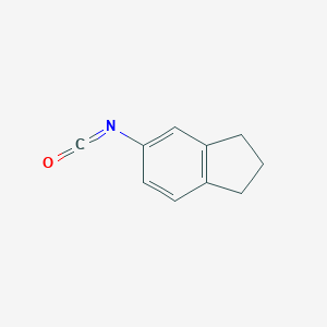 molecular formula C10H9NO B043990 5-Indanyl isocyanate CAS No. 120912-37-0