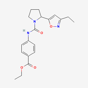 molecular formula C19H23N3O4 B4479775 Ethyl 4-{[2-(3-ethyl-1,2-oxazol-5-YL)pyrrolidine-1-carbonyl]amino}benzoate 