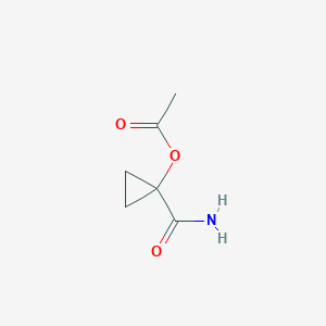 molecular formula C6H9NO3 B045115 1-Carbamoylcyclopropyl acetate CAS No. 123032-98-4