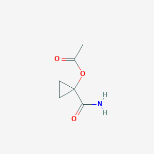 molecular formula C6H9NO3 B045115 Cyclopropanecarboxamide, 1-(acetyloxy)-(9CI) CAS No. 123032-98-4