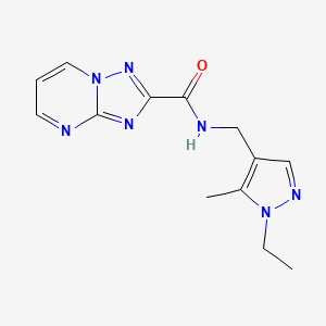 molecular formula C13H15N7O B4542356 N-[(1-ethyl-5-methyl-1H-pyrazol-4-yl)methyl][1,2,4]triazolo[1,5-a]pyrimidine-2-carboxamide 