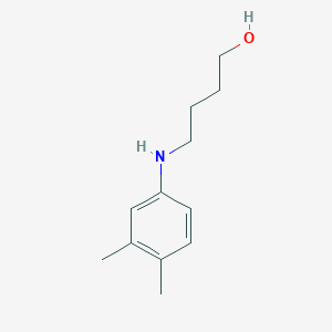B464587 4-(3,4-Dimethyl-phenylamino)-butan-1-ol CAS No. 327070-54-2