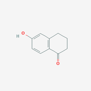 molecular formula C10H10O2 B047845 6-Hydroxy-1-tetralone CAS No. 3470-50-6