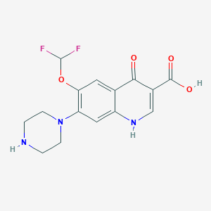 molecular formula C15H15F2N3O4 B047912 6-Difluoromethoxy-7-piperazinyl-3-quinolonecarboxylic acid CAS No. 121935-03-3