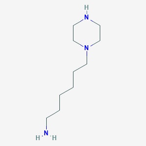 molecular formula C10H23N3 B050039 6-(Piperazin-1-YL)hexan-1-amine CAS No. 115986-20-4