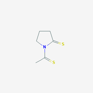 molecular formula C6H9NS2 B050127 1-Ethanethioylpyrrolidine-2-thione CAS No. 121103-26-2