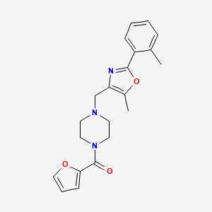 molecular formula C21H23N3O3 B5203443 Furan-2-yl-[4-[[5-methyl-2-(2-methylphenyl)-1,3-oxazol-4-yl]methyl]piperazin-1-yl]methanone 