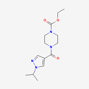 molecular formula C14H22N4O3 B5330127 ethyl 4-[(1-isopropyl-1H-pyrazol-4-yl)carbonyl]-1-piperazinecarboxylate 