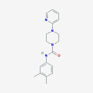 molecular formula C18H22N4O B5336704 N-(3,4-dimethylphenyl)-4-(2-pyridinyl)-1-piperazinecarboxamide 