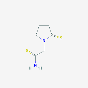 molecular formula C6H10N2S2 B053879 2-Thioxo-1-pyrrolidinethioacetamide CAS No. 117947-07-6