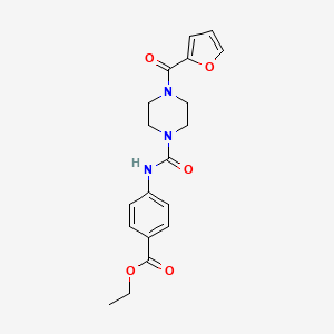 molecular formula C19H21N3O5 B5438327 ETHYL 4-({[4-(2-FURYLCARBONYL)PIPERAZINO]CARBONYL}AMINO)BENZOATE 