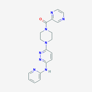molecular formula C18H18N8O B5516877 6-[4-(2-pyrazinylcarbonyl)-1-piperazinyl]-N-2-pyridinyl-3-pyridazinamine 