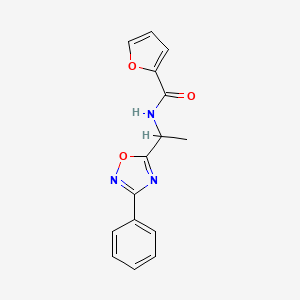 molecular formula C15H13N3O3 B5528008 N-[1-(3-phenyl-1,2,4-oxadiazol-5-yl)ethyl]-2-furamide 