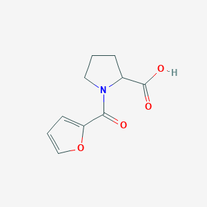 molecular formula C10H11NO4 B055284 1-(Furan-2-carbonyl)pyrrolidine-2-carboxylic acid CAS No. 117918-56-6