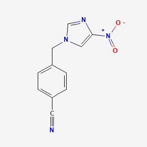 molecular formula C11H8N4O2 B5533794 4-[(4-Nitroimidazolyl)methyl]benzenecarbonitrile 
