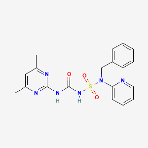 molecular formula C19H20N6O3S B5575104 1-[Benzyl(pyridin-2-yl)sulfamoyl]-3-(4,6-dimethylpyrimidin-2-yl)urea 