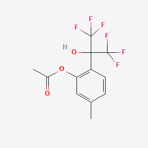 molecular formula C12H10F6O3 B5579476 2-(1,1,1,3,3,3-Hexafluoro-2-hydroxypropan-2-yl)-5-methylphenyl acetate 