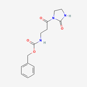 molecular formula C14H17N3O4 B5601705 Benzyl [3-oxo-3-(2-oxoimidazolidin-1-yl)propyl]carbamate 