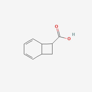 molecular formula C9H10O2 B560975 Bicyclo[4.2.0]octa-2,4-diene-7-carboxylic acid CAS No. 100162-10-5