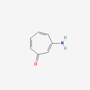 molecular formula C7H7NO B560978 Tropone, 3-amino- CAS No. 19617-09-5