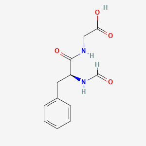 molecular formula C12H14N2O4 B561011 For-phe-gly-OH CAS No. 100135-64-6