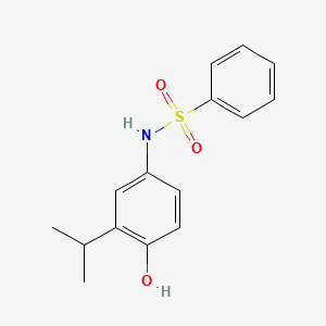 molecular formula C15H17NO3S B5641432 N-(4-hydroxy-3-propan-2-ylphenyl)benzenesulfonamide 