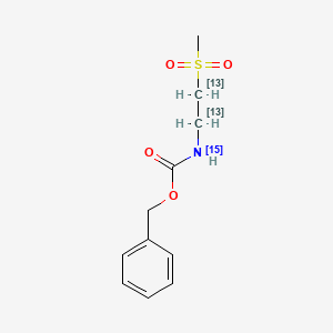 molecular formula C11H15NO4S B565347 benzyl N-(2-methylsulfonyl(1,2-13C2)ethyl)carbamate CAS No. 1215476-69-9