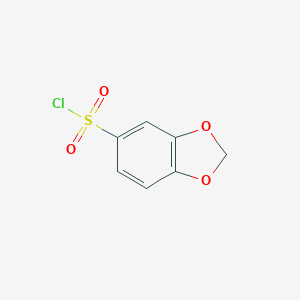 molecular formula C7H5ClO4S B056689 1,3-Benzodioxole-5-sulfonyl chloride CAS No. 115010-10-1