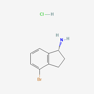 molecular formula C9H11BrClN B566996 (R)-4-溴-2,3-二氢-1H-茚-1-胺盐酸盐 CAS No. 1228556-71-5