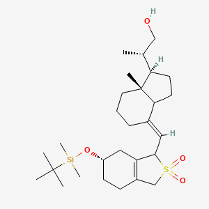 molecular formula C28H48O4SSi B569314 (2S)-2-[(1R,4E,7aR)-4-[[(6S)-6-[tert-butyl(dimethyl)silyl]oxy-2,2-dioxo-1,3,4,5,6,7-hexahydro-2-benzothiophen-1-yl]methylidene]-7a-methyl-2,3,3a,5,6,7-hexahydro-1H-inden-1-yl]propan-1-ol CAS No. 344798-31-8