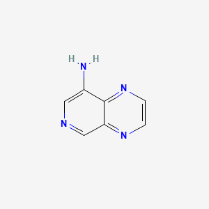 molecular formula C7H6N4 B569385 Pyrido[3,4-b]pyrazin-8-amine CAS No. 120208-34-6