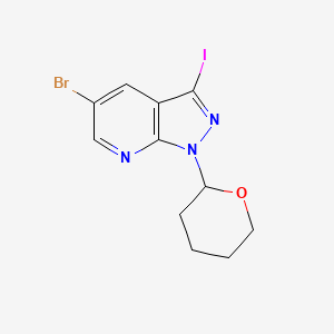 molecular formula C11H11BrIN3O B569404 5-Bromo-3-iodo-1-(tetrahydro-2H-pyran-2-yl)-1H-pyrazolo[3,4-b]pyridine CAS No. 1416713-91-1