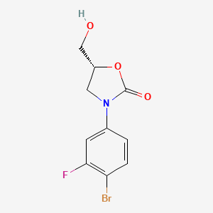 molecular formula C10H9BrFNO3 B569452 (R)-3-(4-Bromo-3-fluorophenyl)-5-(hydroxymethyl)oxazolidin-2-one CAS No. 444335-16-4