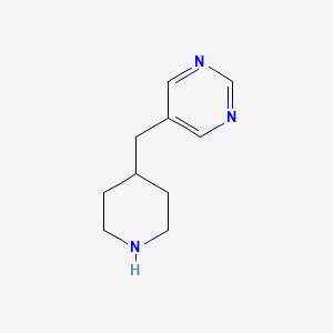 molecular formula C10H15N3 B569612 5-(Piperidin-4-ylmethyl)pyrimidine CAS No. 1211532-41-0