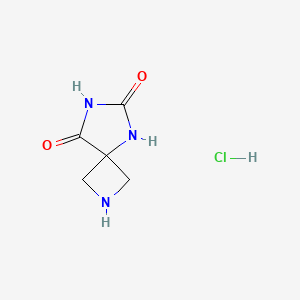 molecular formula C5H8ClN3O2 B570376 2,5,7-Triazaspiro[3.4]octane-6,8-dione hydrochloride CAS No. 1026796-27-9