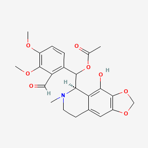 molecular formula C23H25NO8 B570472 [(2-Formyl-3,4-dimethoxyphenyl)-[(5R)-4-hydroxy-6-methyl-7,8-dihydro-5H-[1,3]dioxolo[4,5-g]isoquinolin-5-yl]methyl] acetate CAS No. 1642137-73-2