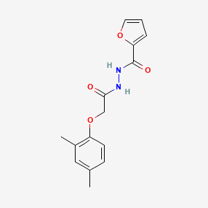 molecular formula C15H16N2O4 B5742625 N'-[2-(2,4-dimethylphenoxy)acetyl]furan-2-carbohydrazide 
