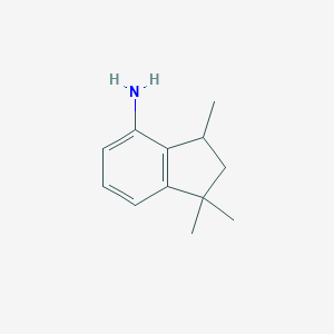 molecular formula C12H17N B057493 1,1,3-三甲基-2,3-二氢-1H-茚-4-胺 CAS No. 94568-76-0