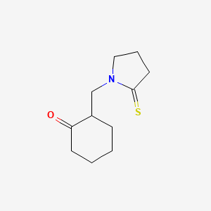 molecular formula C11H17NOS B575178 1-[(2-Oxocyclohexyl)methyl]pyrrolidine-2-thione CAS No. 189940-41-8