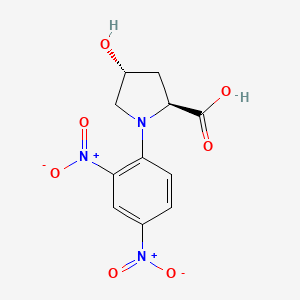 molecular formula C11H11N3O7 B579068 N-2-4-Dnp-hydroxy-L-proline crystalline CAS No. 16220-71-6