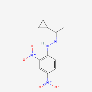 molecular formula C12H14N4O4 B579562 1-[1-[2-(2,4-Dinitrophenyl)hydrazono]ethyl]-2-methylcyclopropane CAS No. 16278-09-4